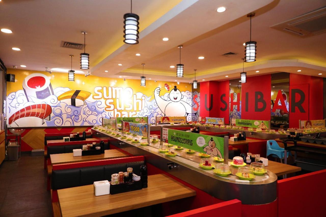 Heavenly Land Family Hotel パレンバン エクステリア 写真